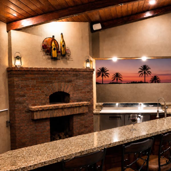 Gossett Oven in a covered outdoor kitchen with bar seating