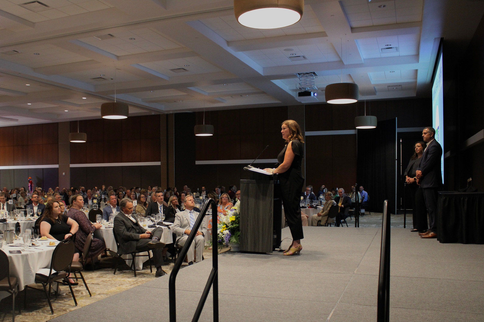 Speaker addressing a ballroom audience at the Terre Haute Convention Center