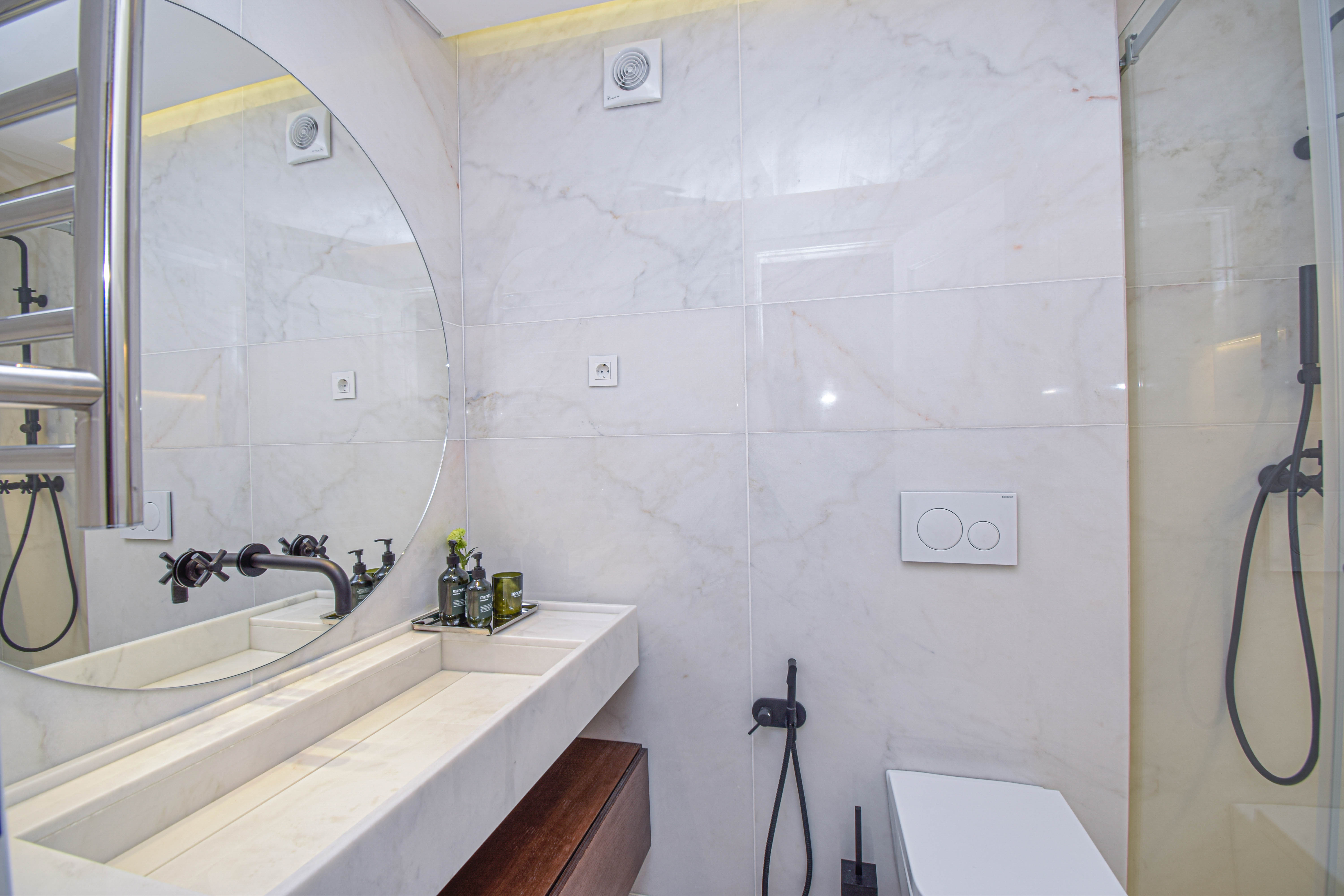 Step into your personal spa retreat with this contemporary bathroom design. Provides the perfect balance between sophistication and relaxation. A tranquil escape from the bustling city.