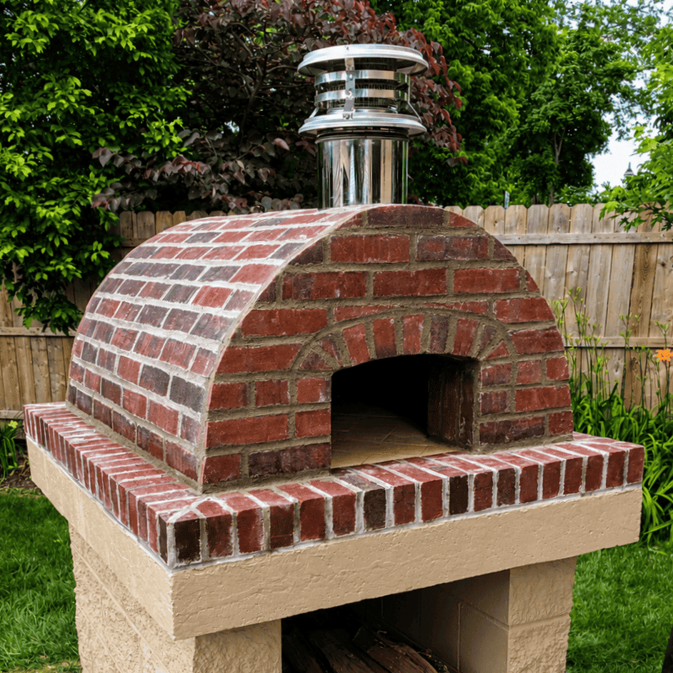 R. Gilmore wood-fired pizza oven with classic red brick dome
