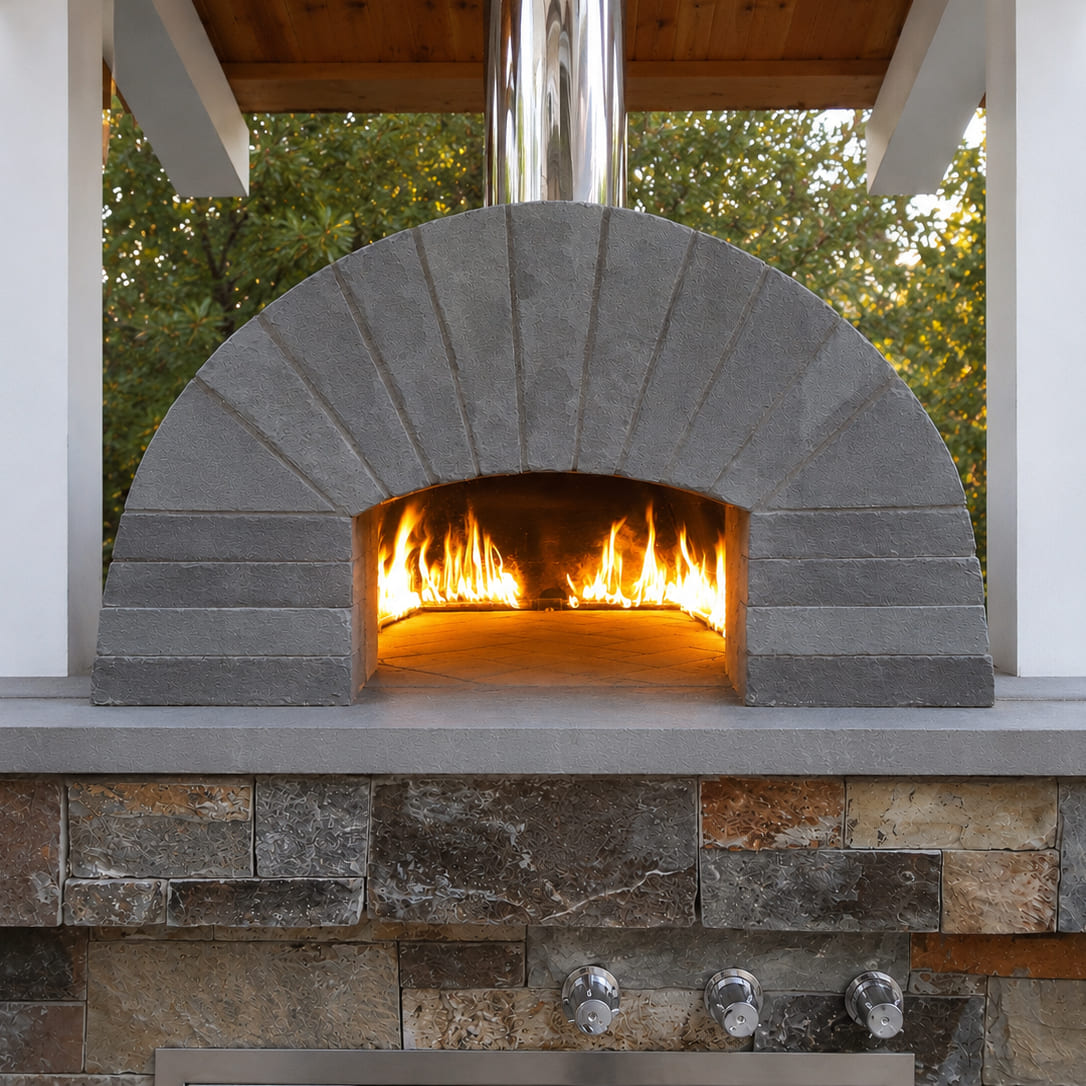 Mauery gas-fired pizza oven with a gray stone veneer base