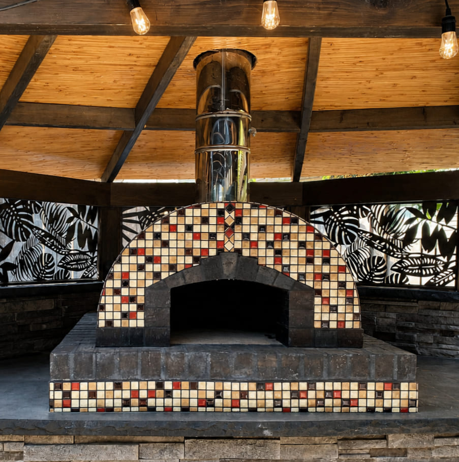 Hammond Oven with mosaic tile beneath a covered patio